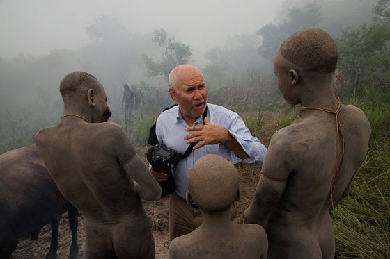 Steve McCurry speaking with men of the Suma tribe, Omo Valley, Ethiopia, 2012